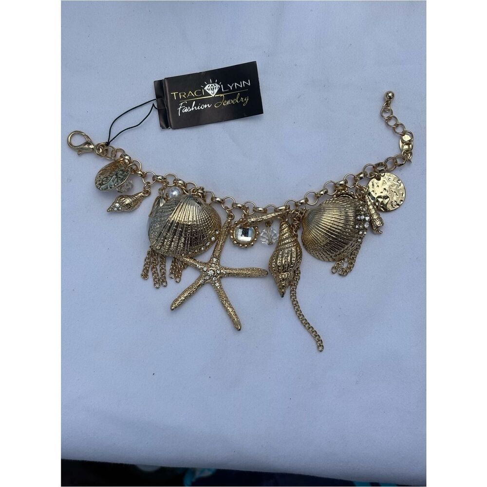 Traci Lynn Gold Sea Charm Bracelet - Gold Shell & Starfish NWT